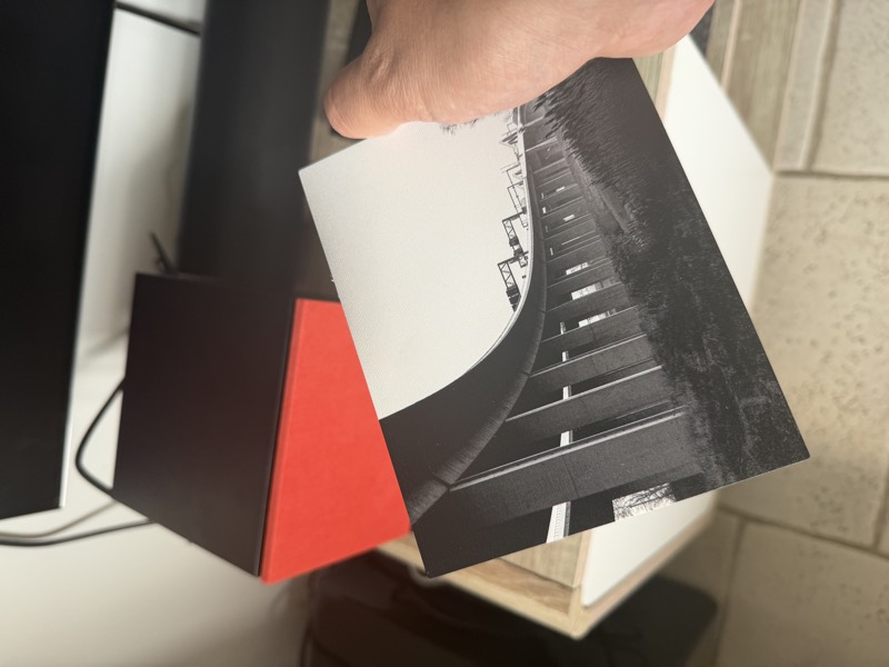 A freshly printed faceplate held in hand